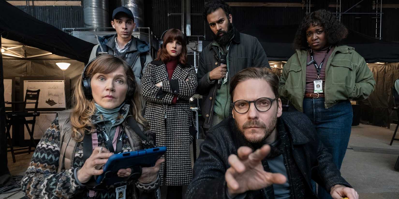The cast of The Franchise look closely at the camera