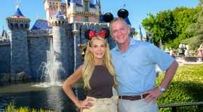 The Golden Bachelorette Joan Vassos and Chock Chapple In Disneyland Holding One Another