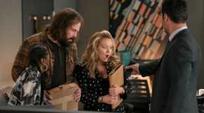 Izzy, Cisco, and Lorna looking at Mickey's phone in The Lincoln Lawyer season 3