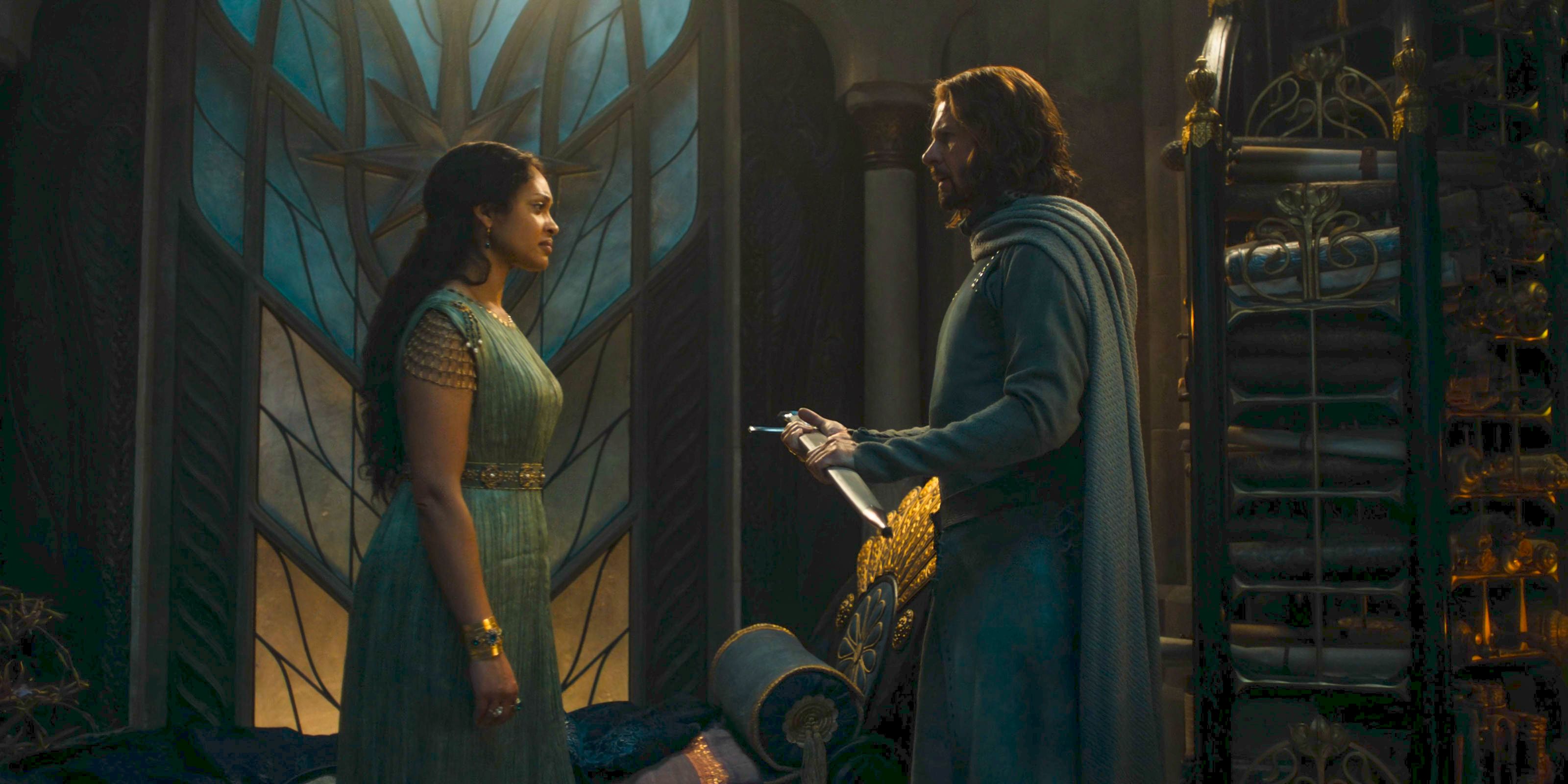 Míriel (Cynthia Addai-Robinson) hands a sword to Elendil (Lloyd Owen) in The Lord of the Rings: The Rings of Power Season 2 Episode 8