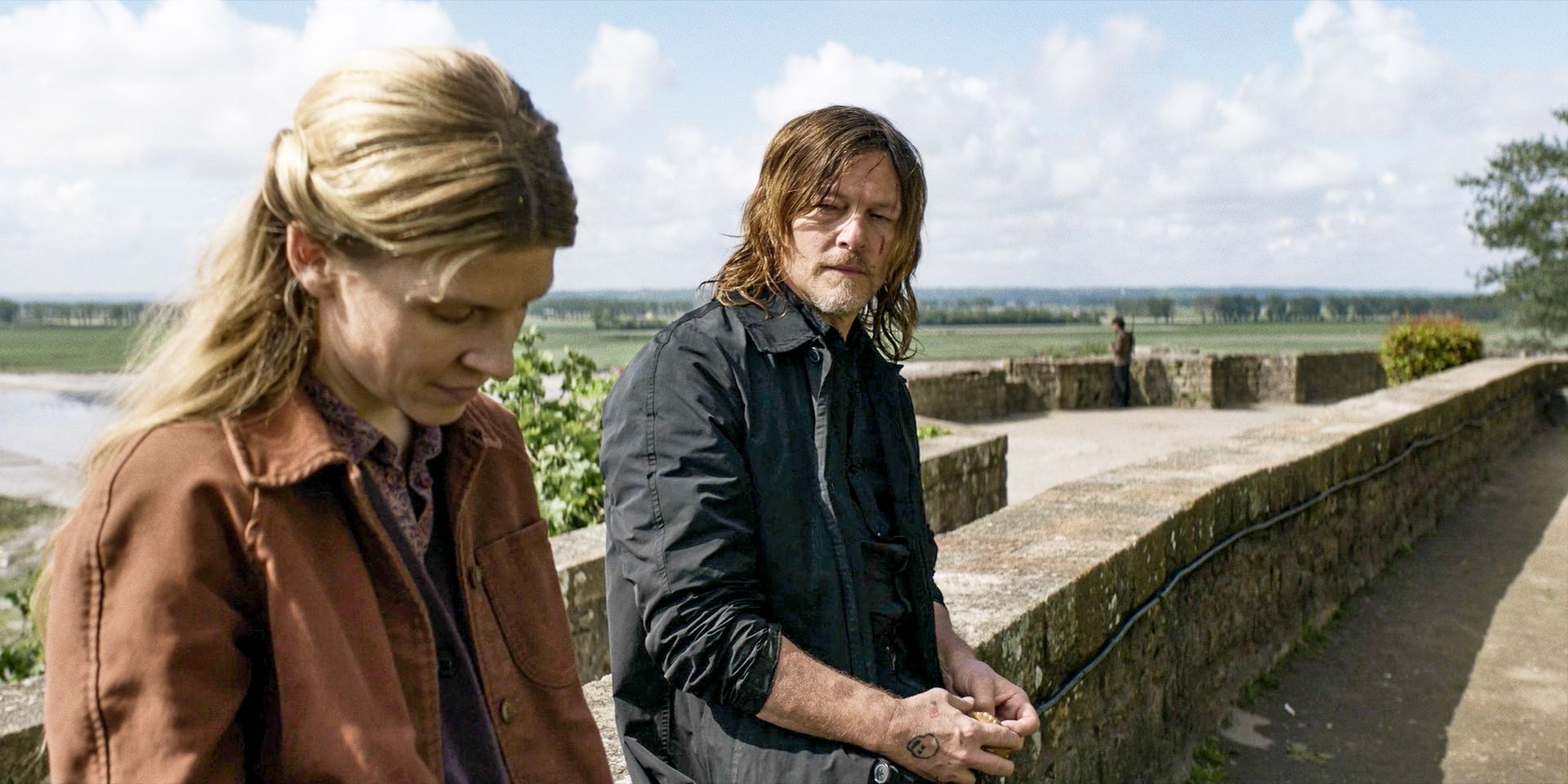 Isabelle (Clémence Poésy) looking away from Daryl (Norman Reedus) in The Walking Dead: Daryl Dixon Season 2 Episode 2