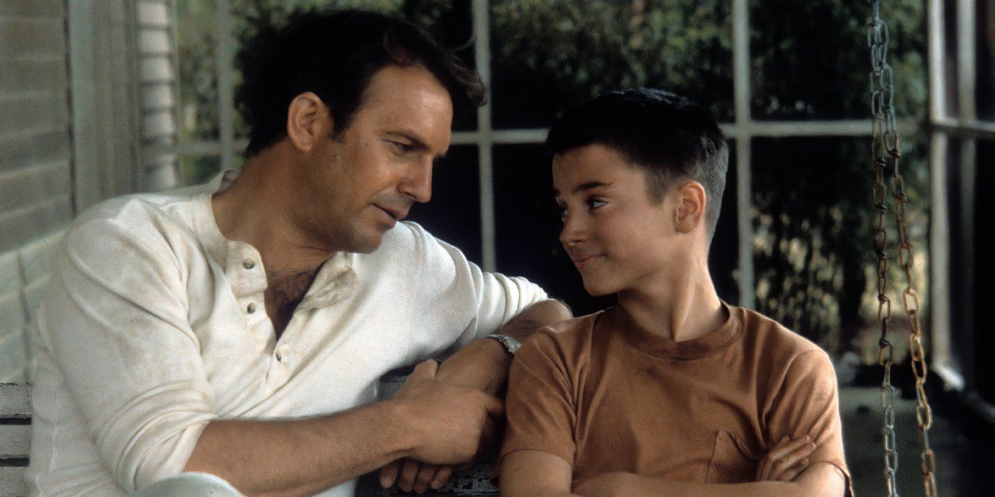 The War Kevin Costner and a young Elijah Wood talking on a porch outside