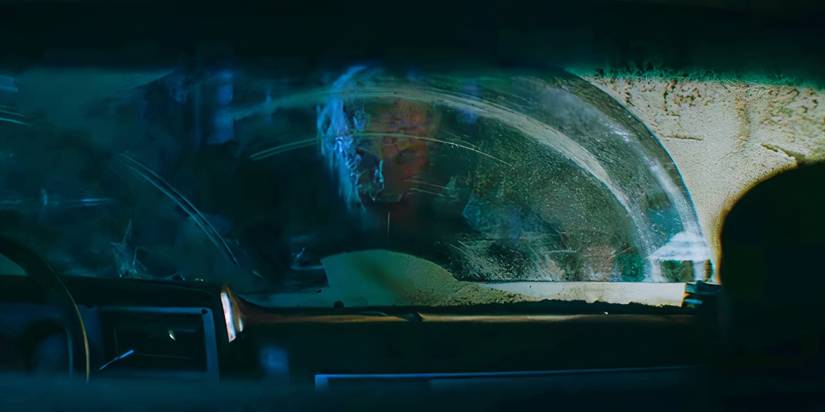 The Wolf Man viewed through a car windshield in Wolf Man 2024