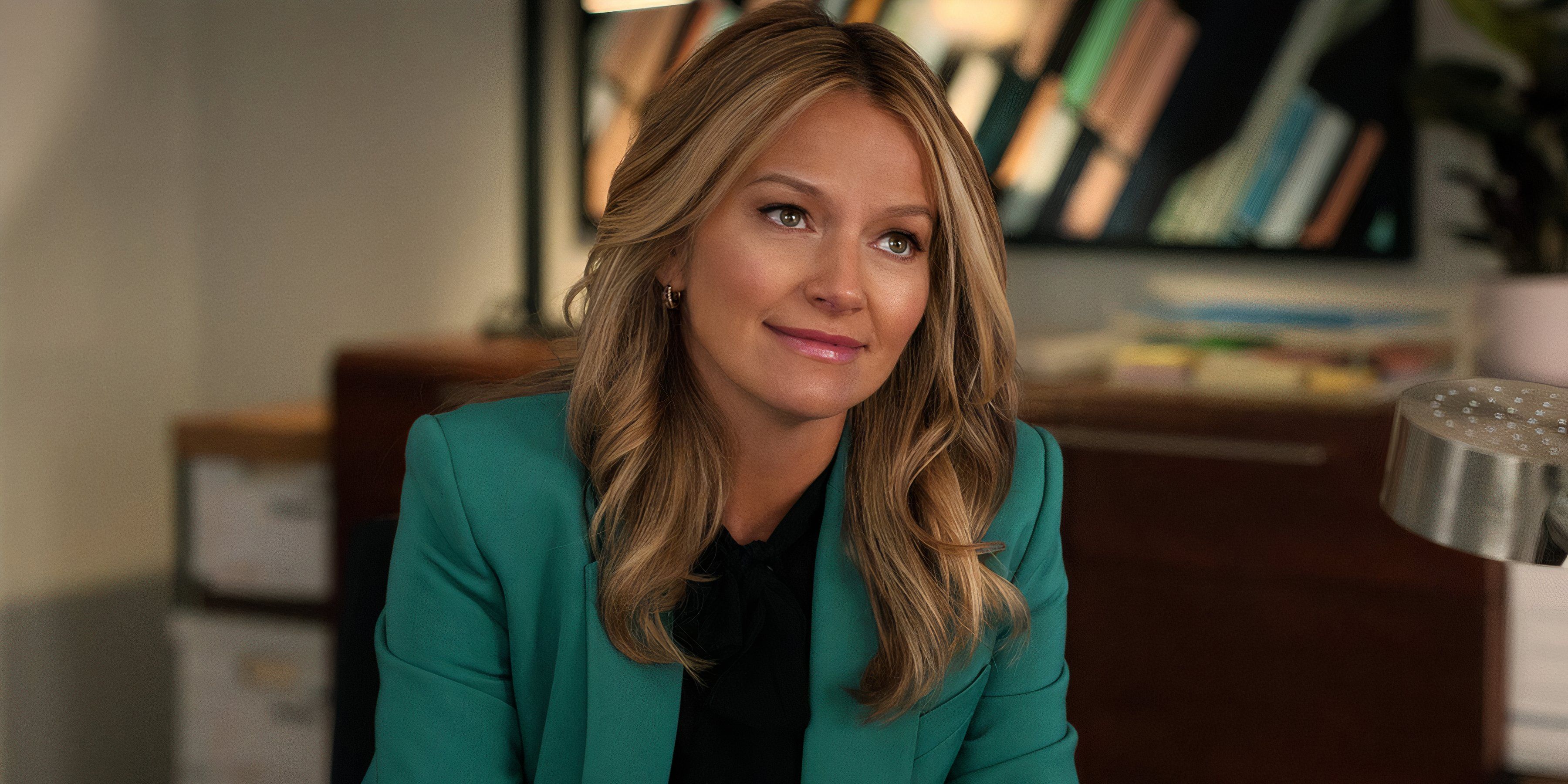 Lorna sits in the office in The Lincoln Lawyer