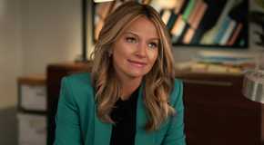 Lorna sits in the office in The Lincoln Lawyer