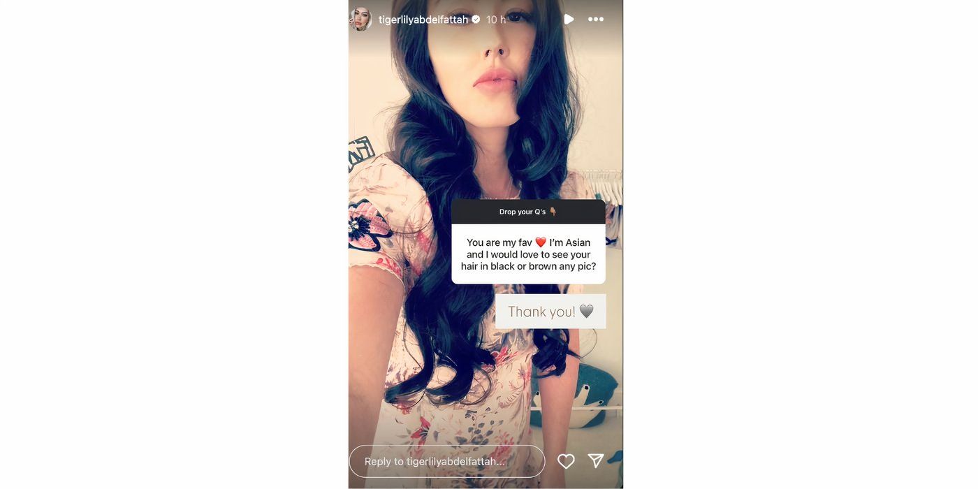 Tigerlily Taylor on 90 Day Fiance taking selfie in floral dress