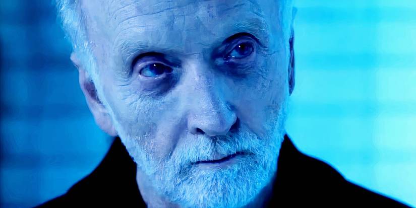 Tobin Bell as Jigsaw gazing at a victim in Saw X