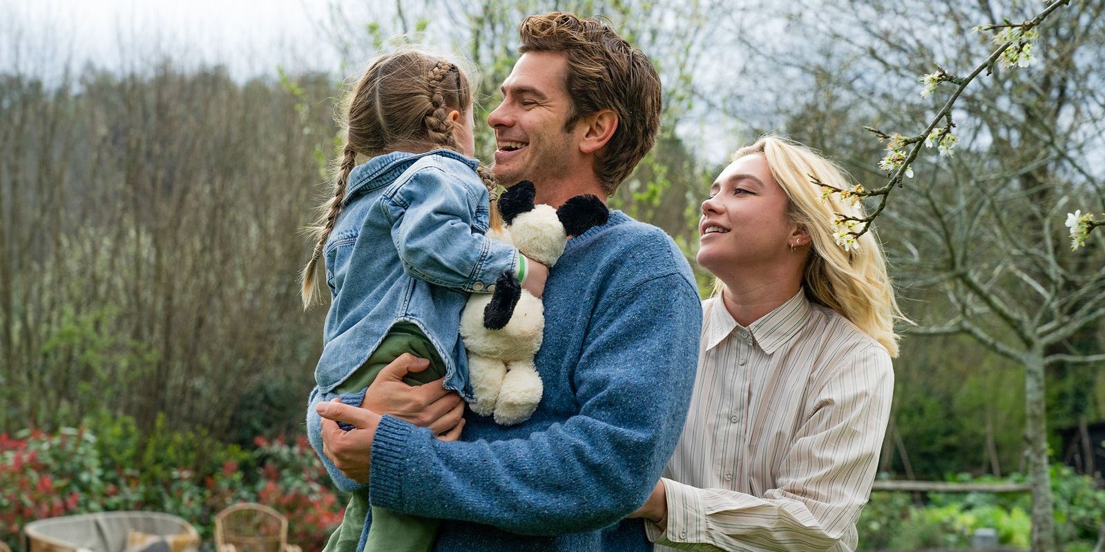 Andrew Garfield and Florence Pugh playing with their kid in We Live in Time