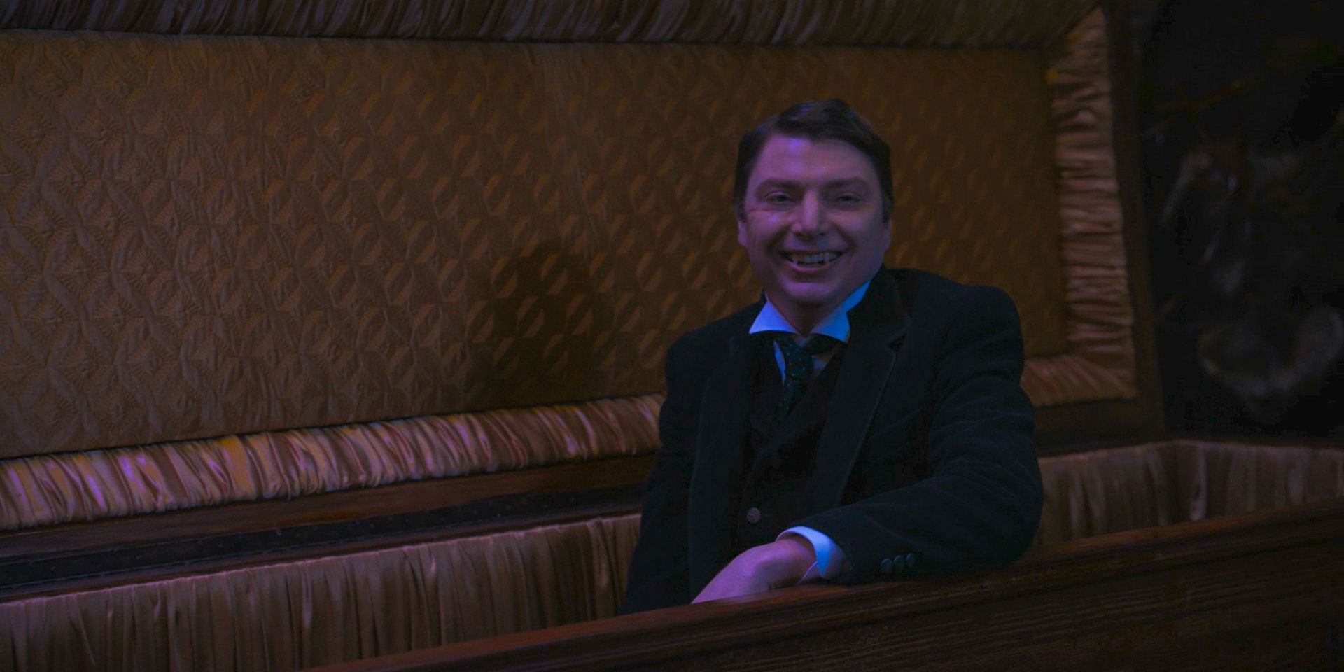 Jerry the Vampire (Michael Patrick O'Brien) smiling inside his coffin in What We Do in the Shadows, Season 6, Episode 1 