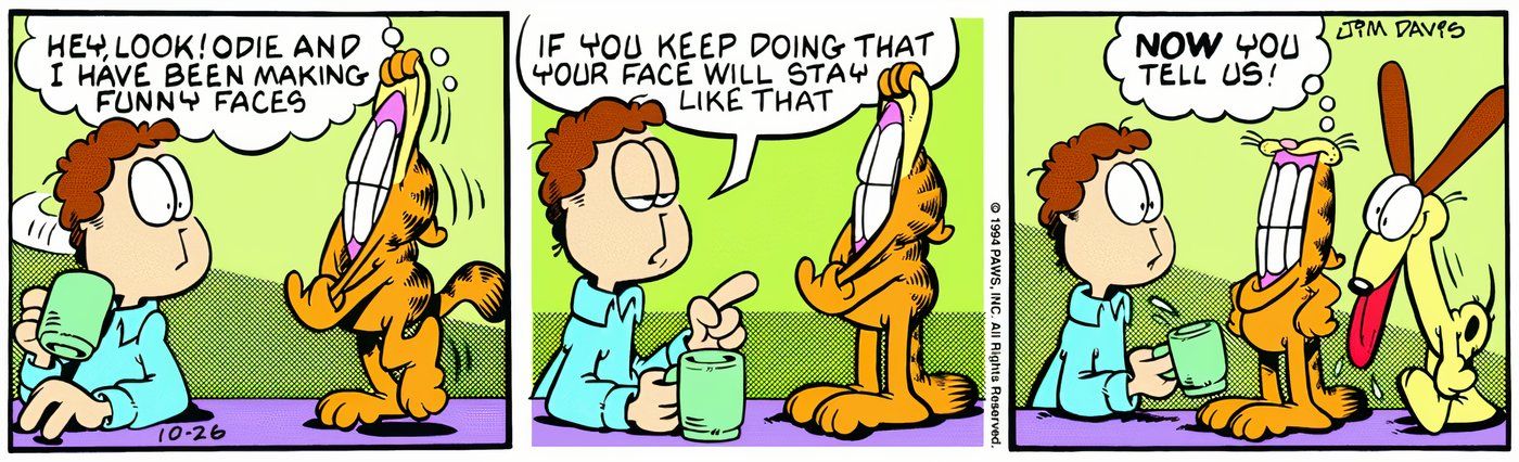 Garfield and Odie making funny faces at Jon.