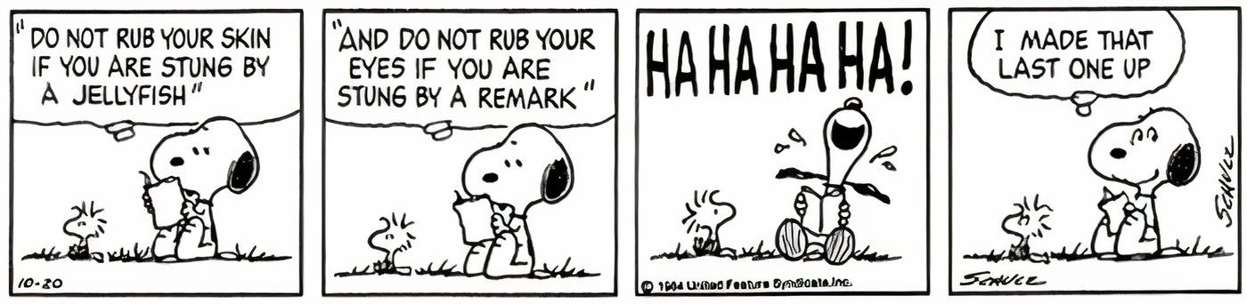 Snoopy laughing at his own joke with Woodstock.