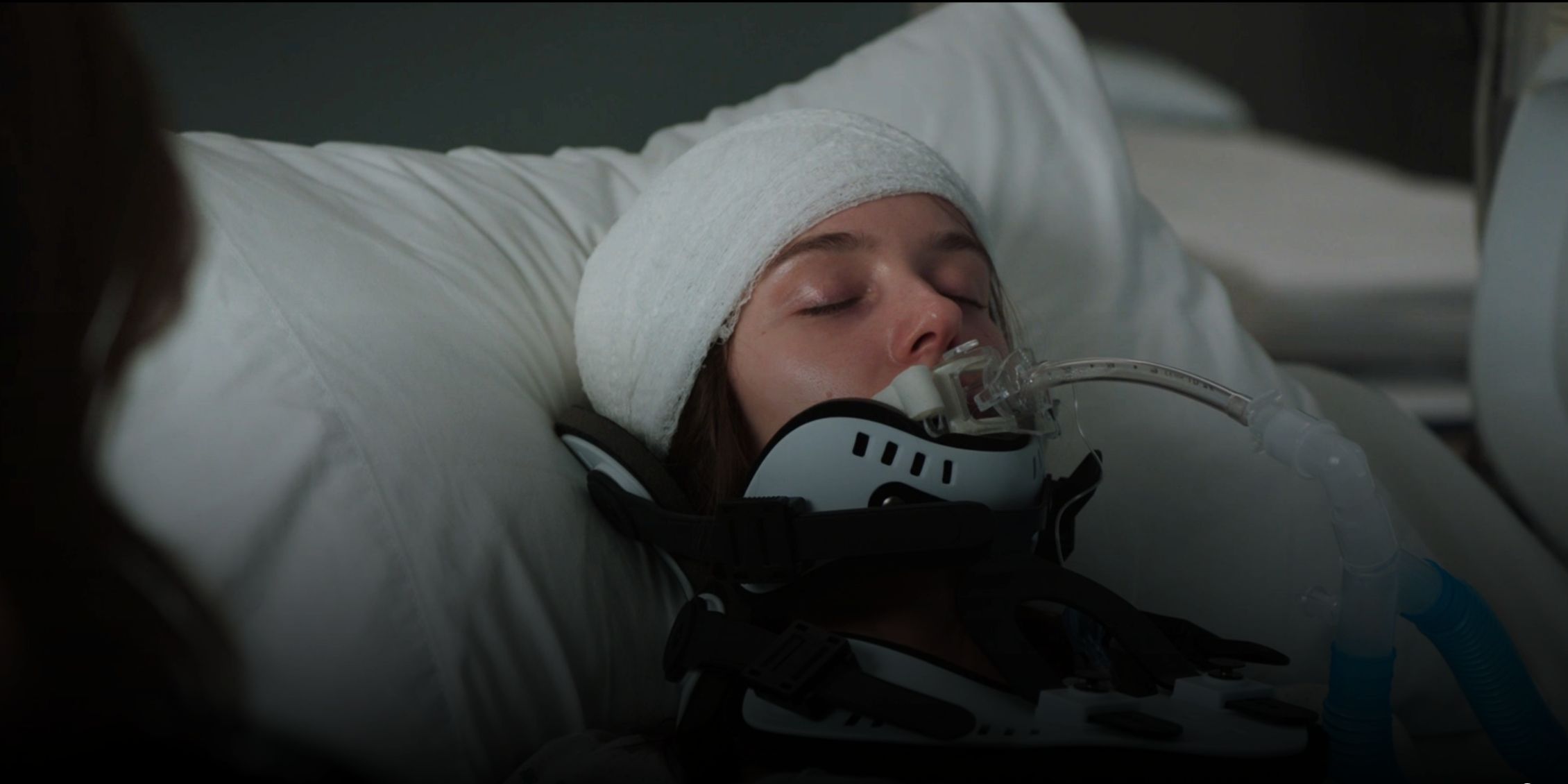 Ellie on life support with a bandage around her head and a breathing tube in her mouth in Law &amp; Order: SVU