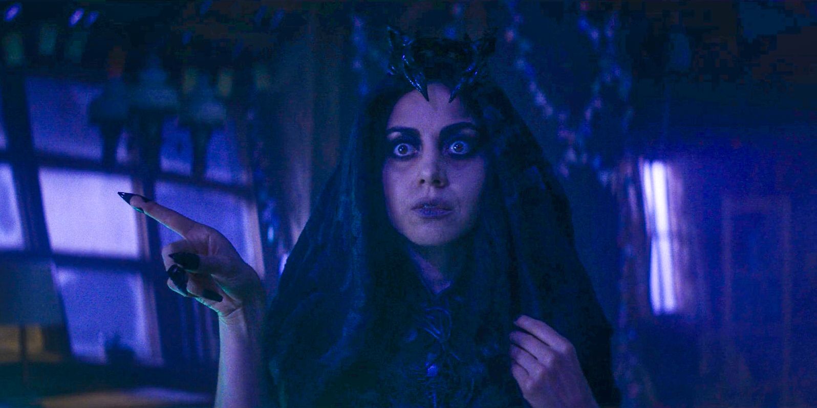 Rio Vidal (Aubrey Plaza) as Death showing the way to Alice in Agatha All Along Season 1 Episode 8