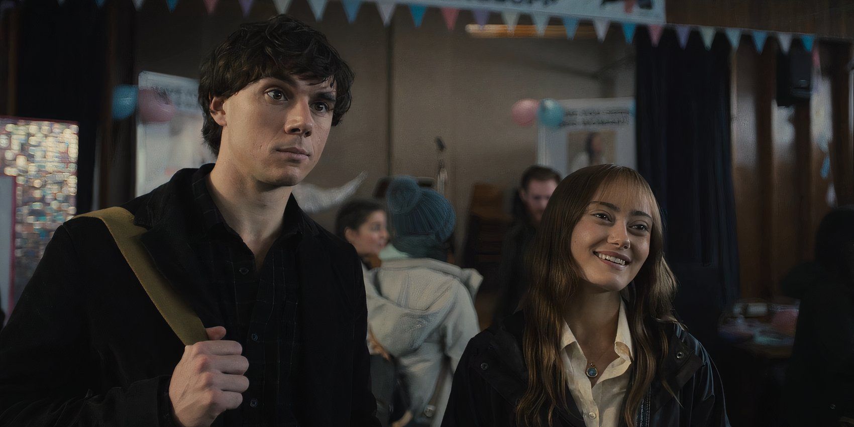 AJ (Calam Lynch) and Rhiannon (Ella Purnell) looking at someone in Sweetpea episode 5