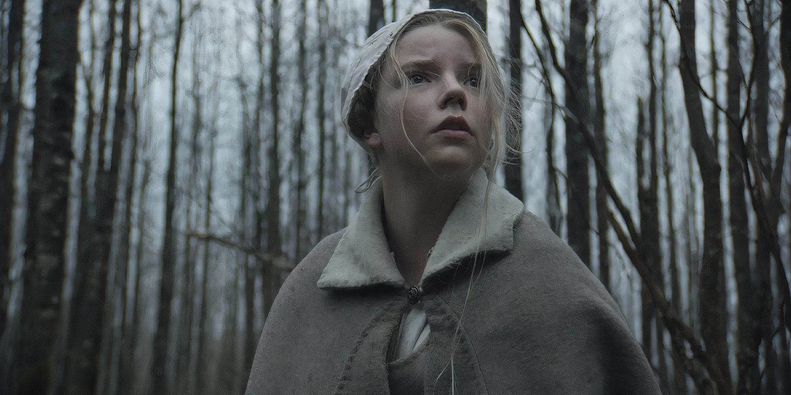 Anya Taylor-Joy looking frightened as Thomasin in The Witch