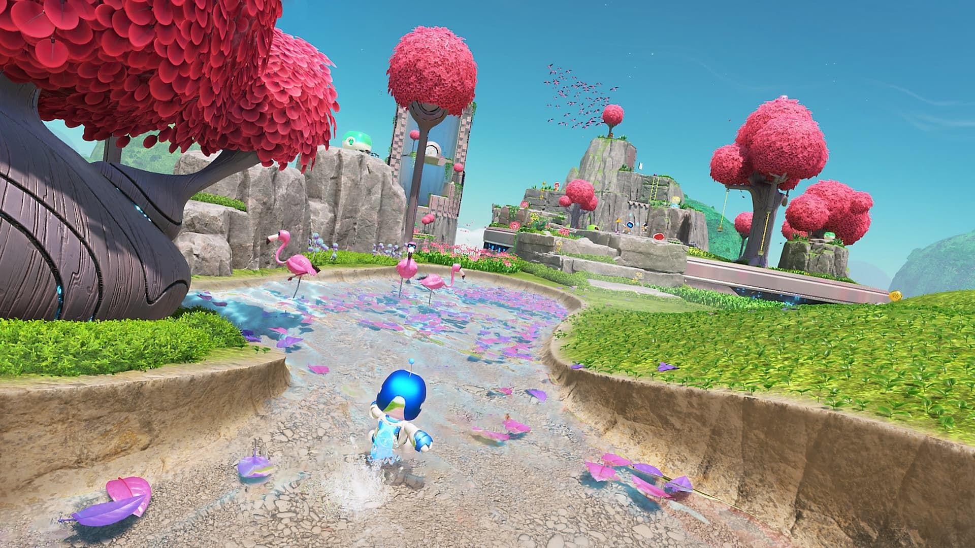 Astro Bot atravessando uma pastagem na estrada com árvores cor de rosa ao redor 