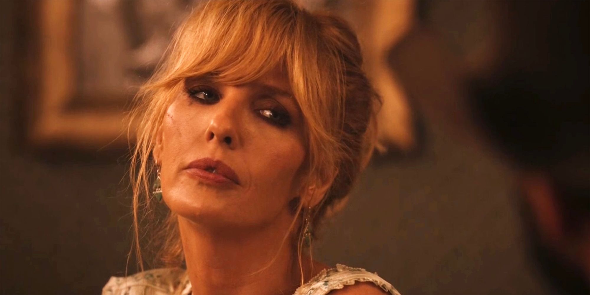 Kelly Reilly with her head back as Beth in Texas in Yellowstone