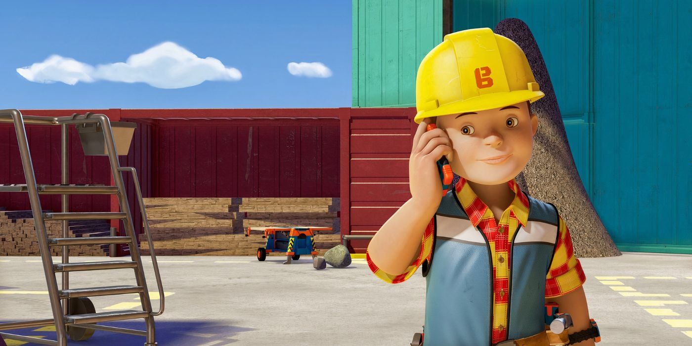 Bob talks on the phone while standing on a construction site in Bob the Builder