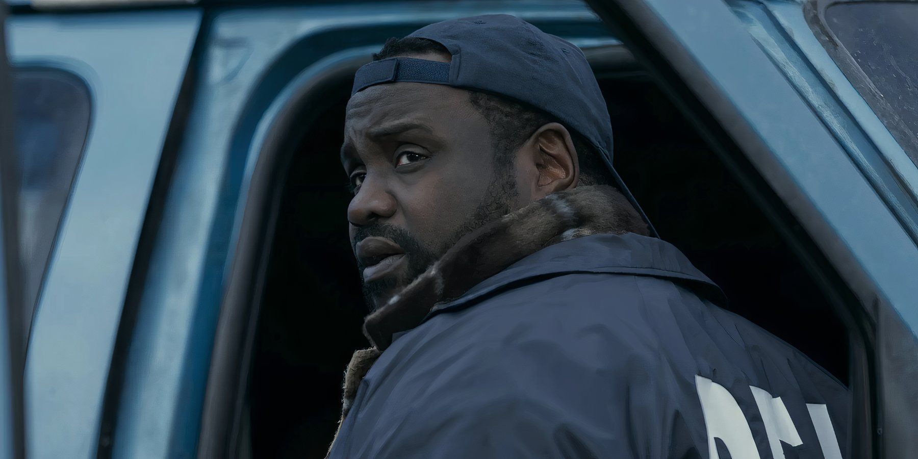 Brian Tyree Henry looking over his shoulder in Dope Thief