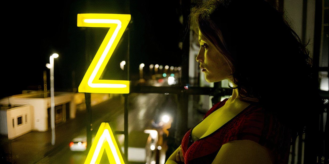 Gemma Arterton standing next to a glowing yellow Z in Byzantium