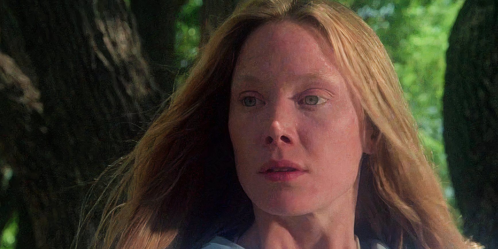 Carrie White in close-up looking vacantly off to the side