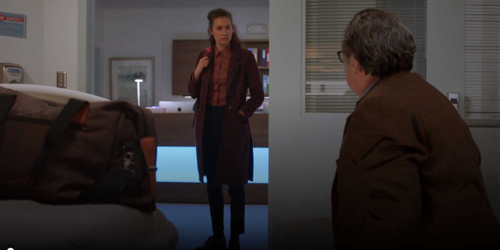 Chicago Med Reese coming into the hospital room where Charles is kneeling by her father's body