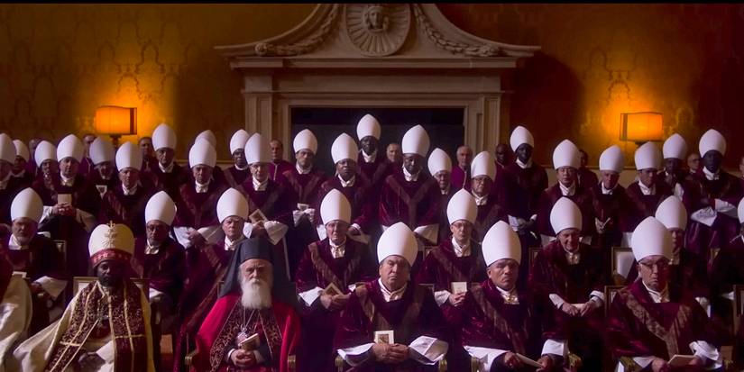 all of the cardinals sitting together in full religious dress in Conclave