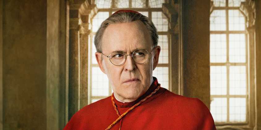 John Lithgow as a cardinal looking suspicious in Conclave