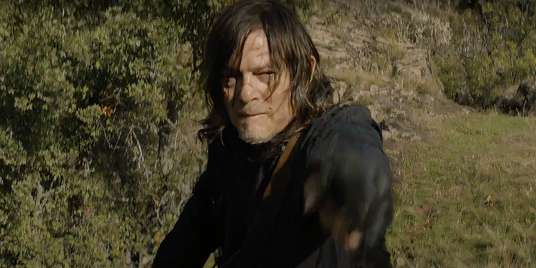 Daryl raising a gun in The Walking Dead Daryl Dixon season 3's trailer.