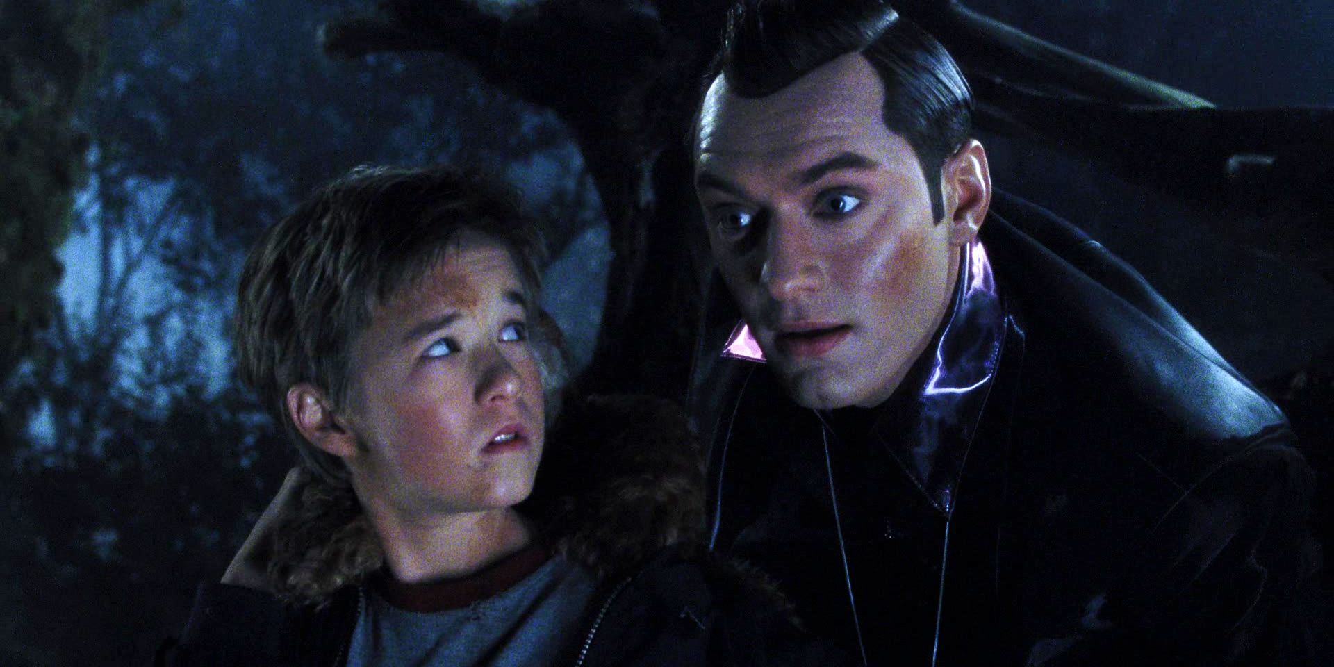 David looks up at Gigolo Joe next to him in AI Artificial Intelligence