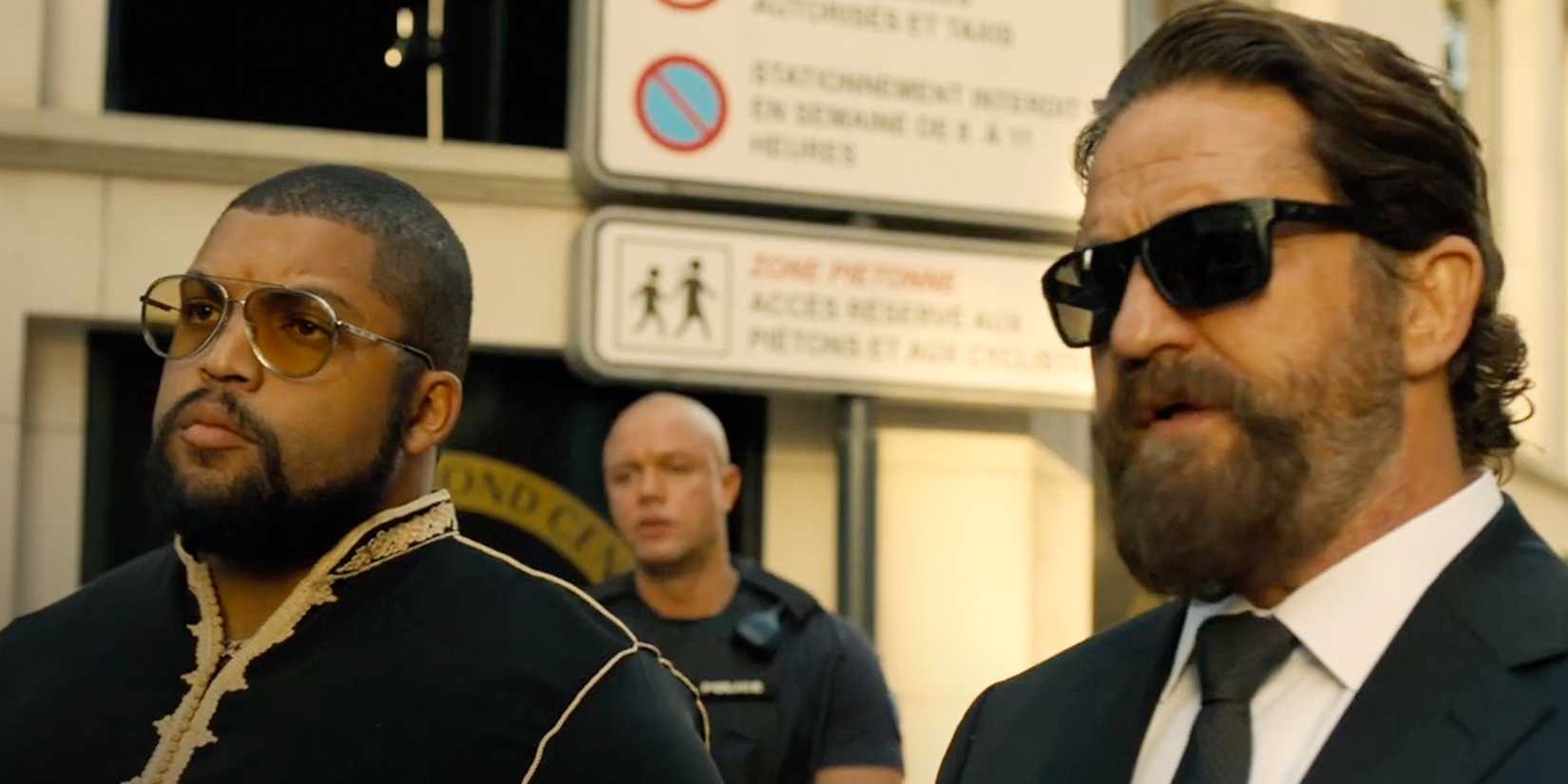 Nick (Gerard Butler) and Donnie (O'Shea Jackson Jr.) standing next to each in Den of Thieves 2