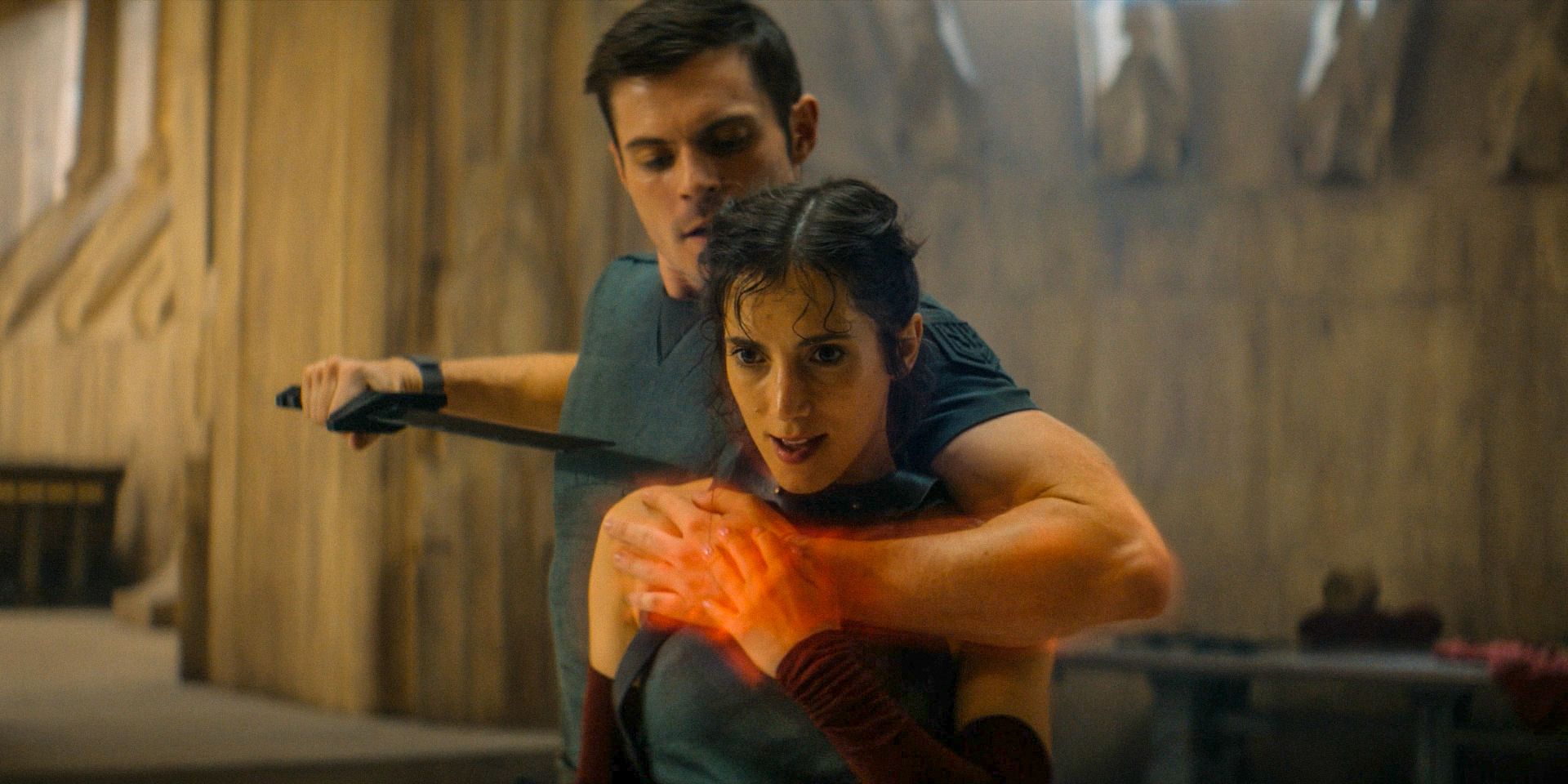 Ynez (Sarah-Sofie Boussnina) in sword master training with Keiran (Chris Mason) in Dune: Prophecy Season 1 Ep 1