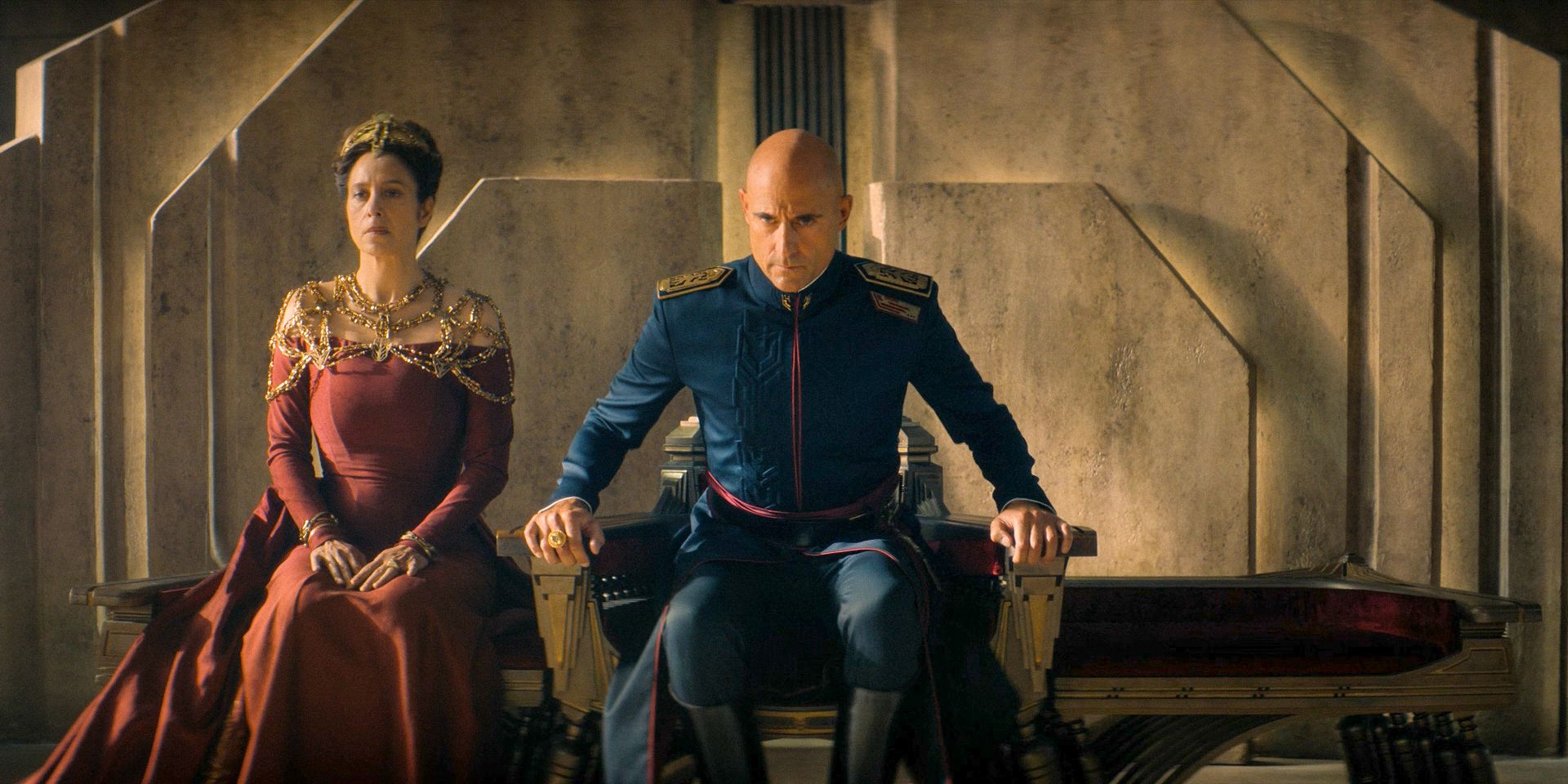 Natalya (Jodhi May) and Emperor Javicco Corrino (Mark Strong) meet their daughter Ynez's fiancé in Dune: Prophecy Season 1 Ep 1