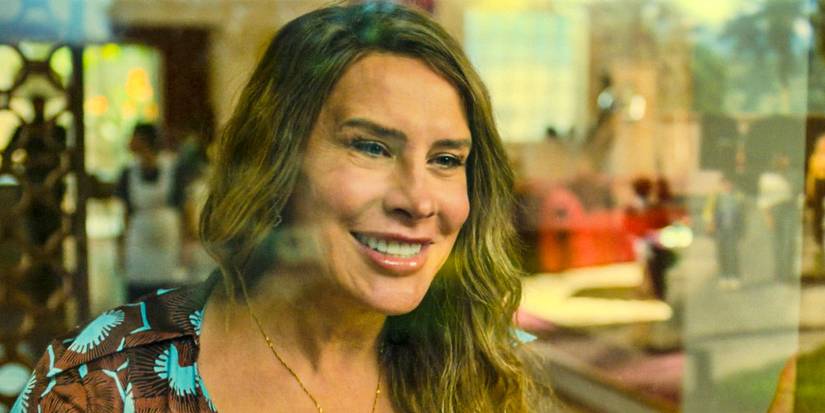 Emilia Pérez (Karla Sofía Gascón) smiles to have her children and Jessi back in Emilia Pérez