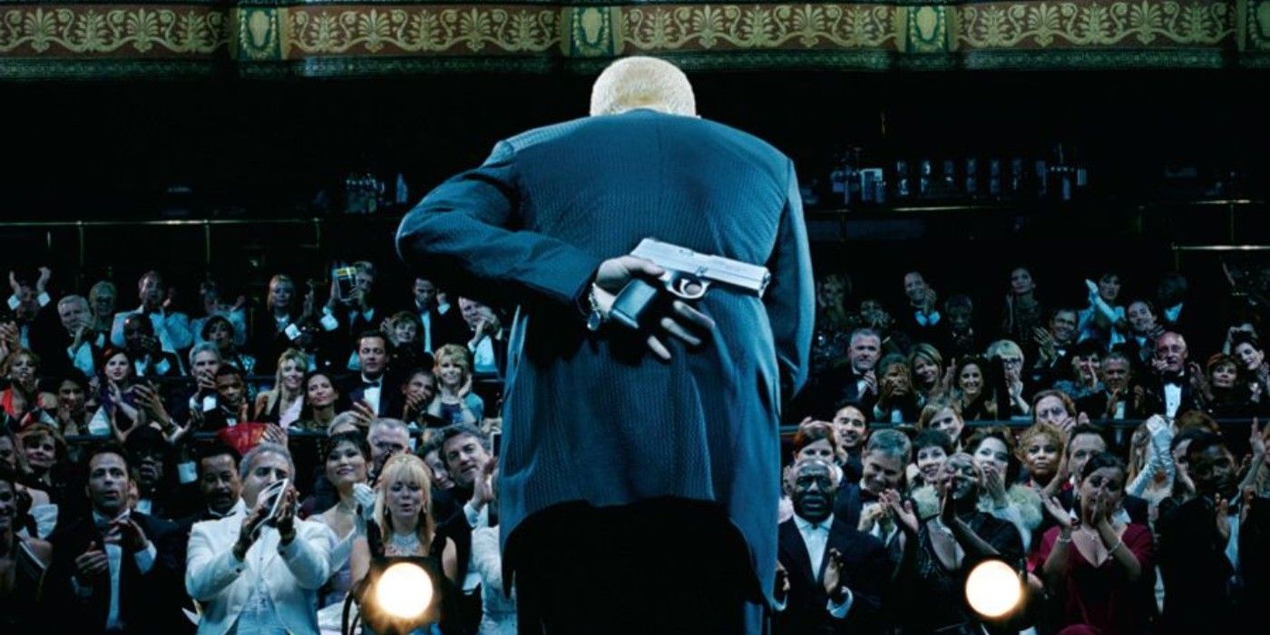 Eminem hides his gun behind his back on the back cover art for Encore