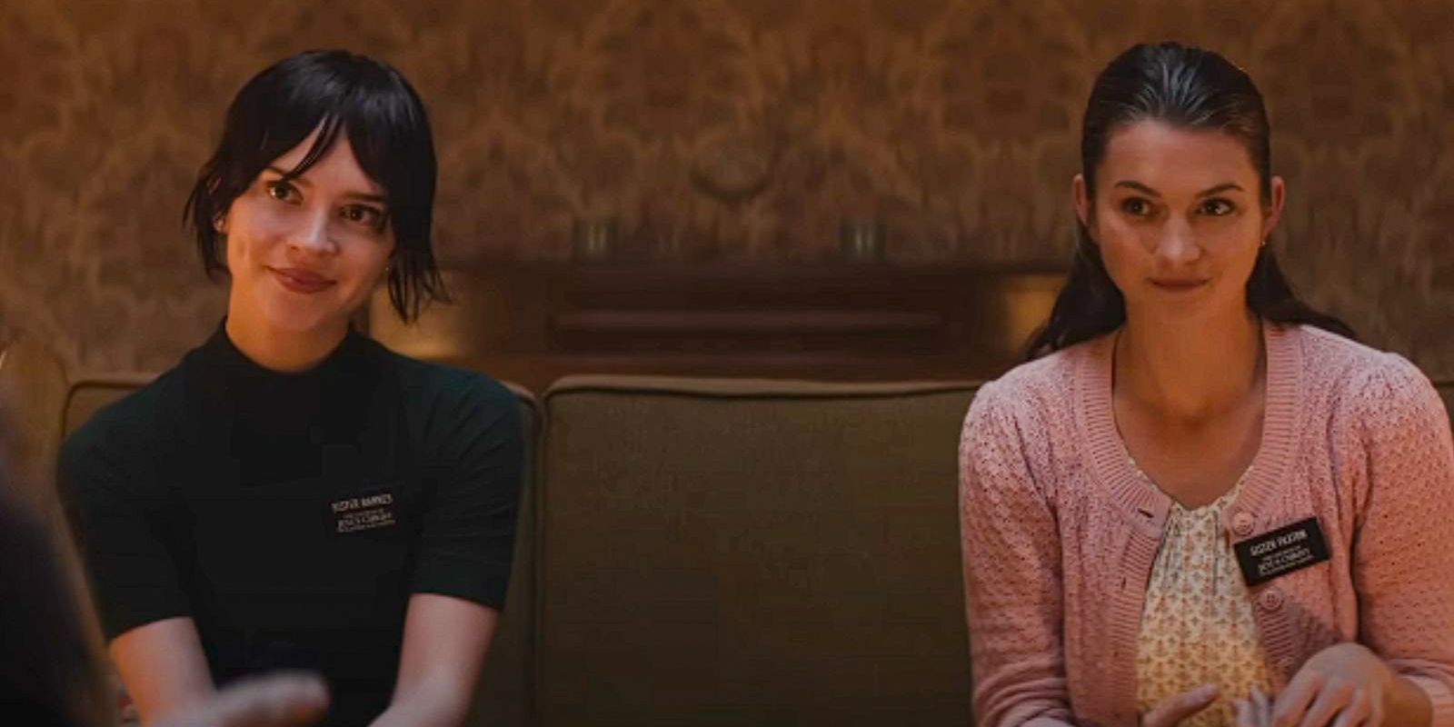 Sister Barnes and Sister Paxton sit in a living room in Heretic