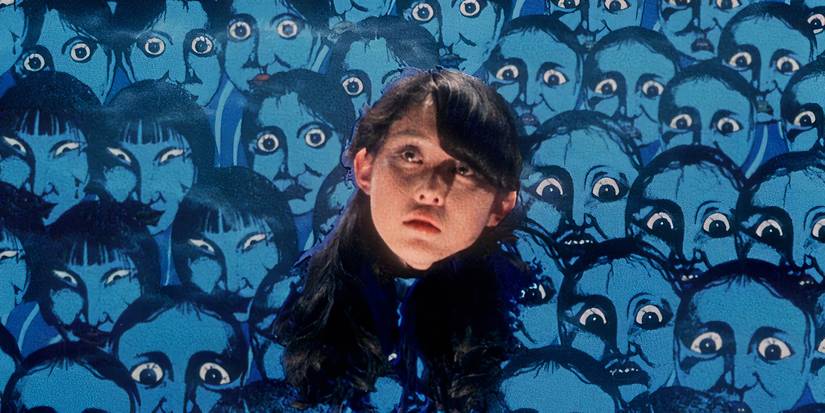 House (1977) japanese woman in front of a sea of blue cartoon faces 