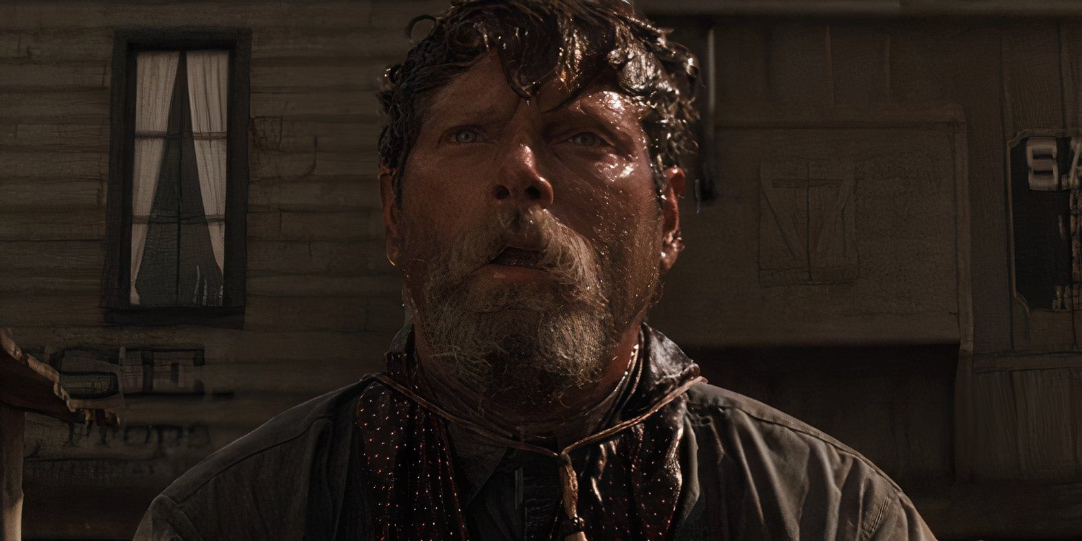 Ike Claron (Stephen Lang) with a head of a tombstone in a tombstone