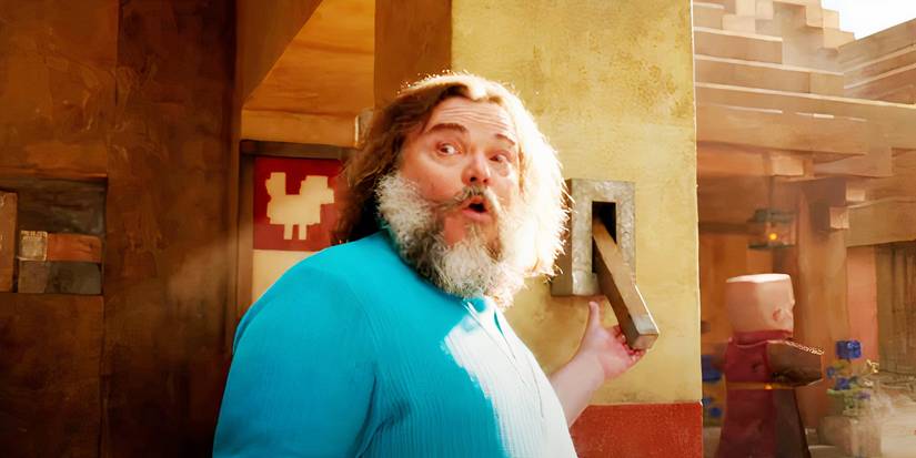 Jack Black about to push a lever as Steve in A Minecraft Movie