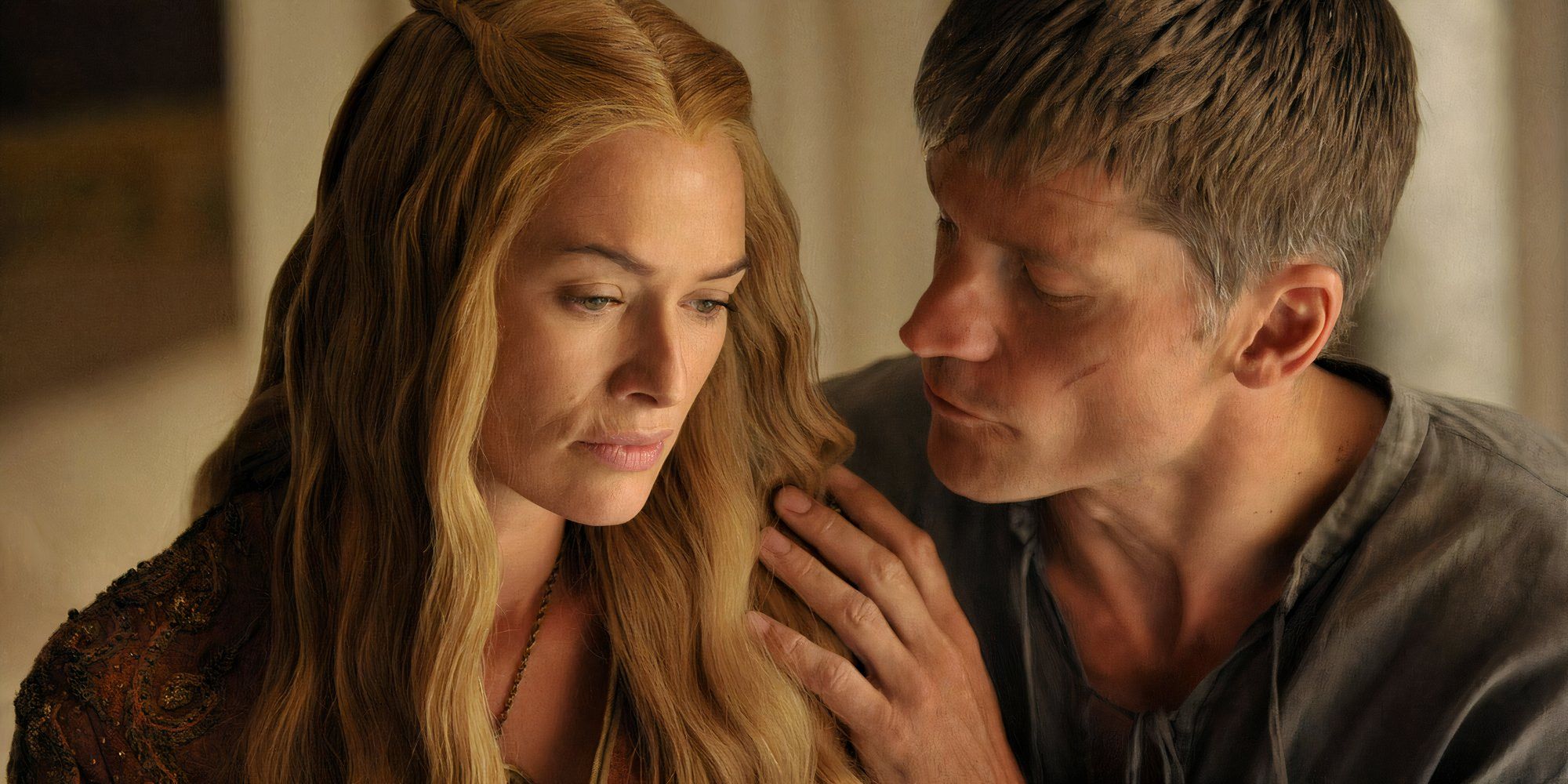 Jaime Lannister (Nikolaj Coster-Waldau) segurando Cersei (Lena Headey) em Game of Thrones