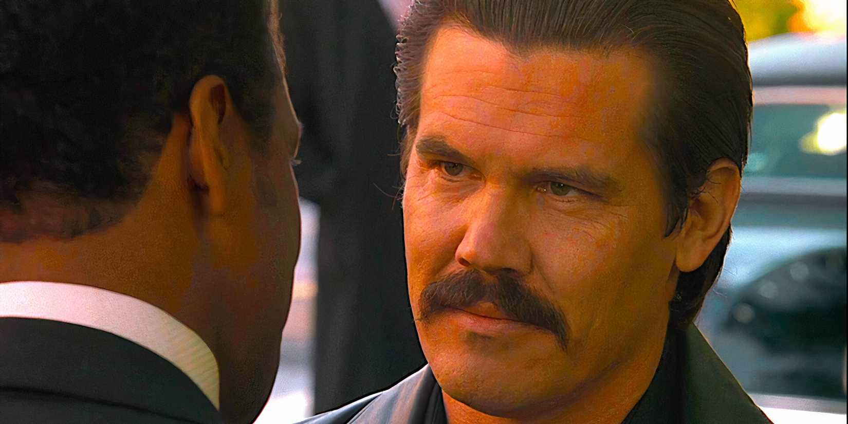 Josh Brolin has an intense exchange with Denzel Washington in a scene from American Gangster