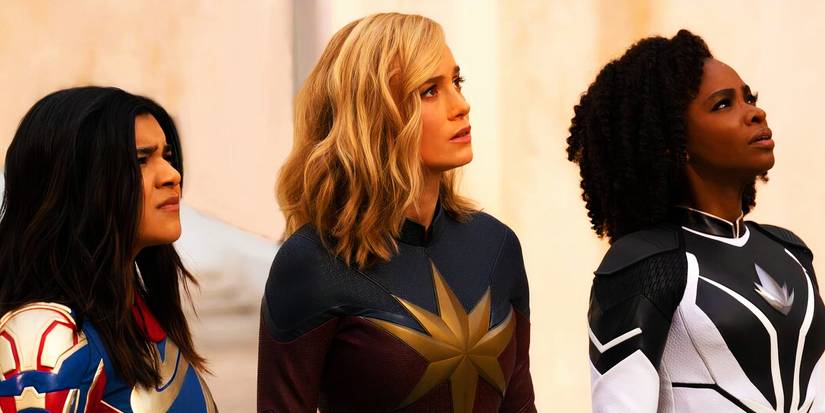 Kamala Khan, Carol Danvers and Monica Rambeau looking up in The Marvels