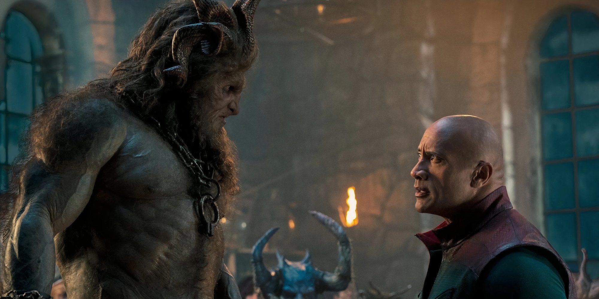 Kristofer Hivju as Krampus and Dwayne Johnson as Callum in Red One