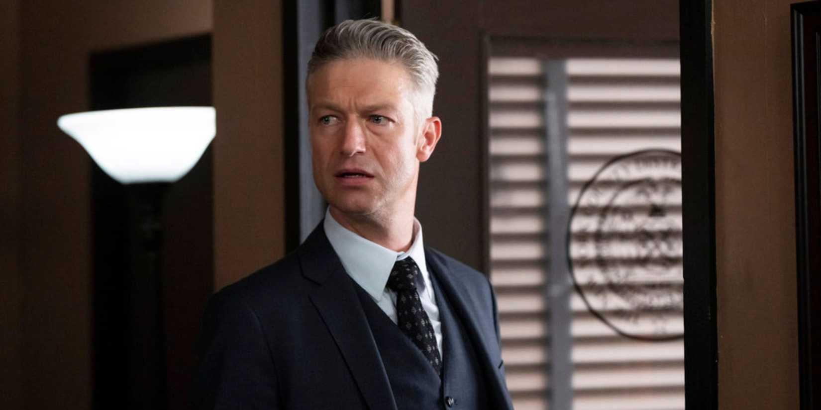 Law & Order SVU Carisi in the office with blinds behind him