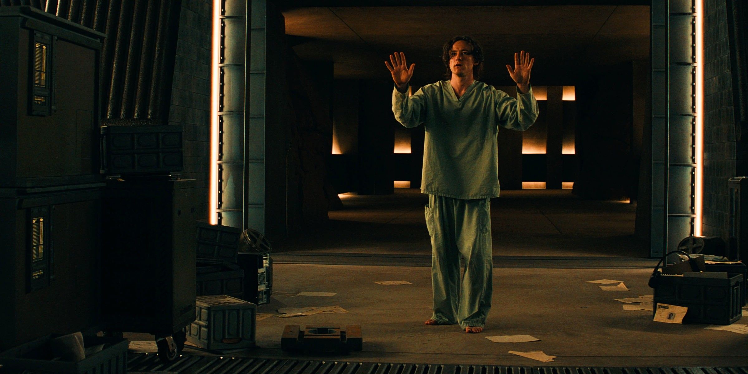 Lewis Pullman As Bob Holding His Hands Up In A Messy Room In Thunderbolts