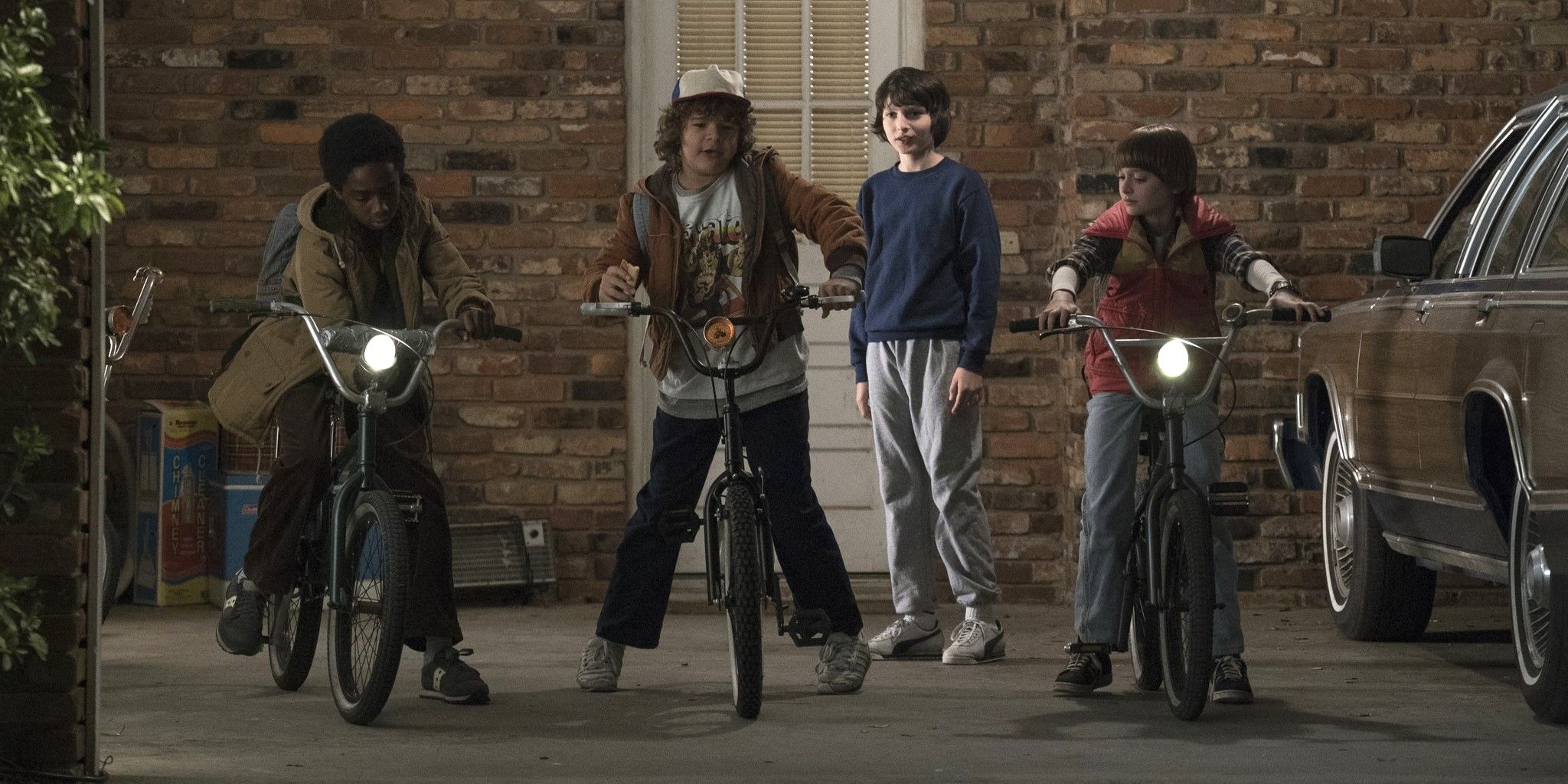 Lucas, Dustin, Mike, and Will in Stranger Things season 1, episode 1