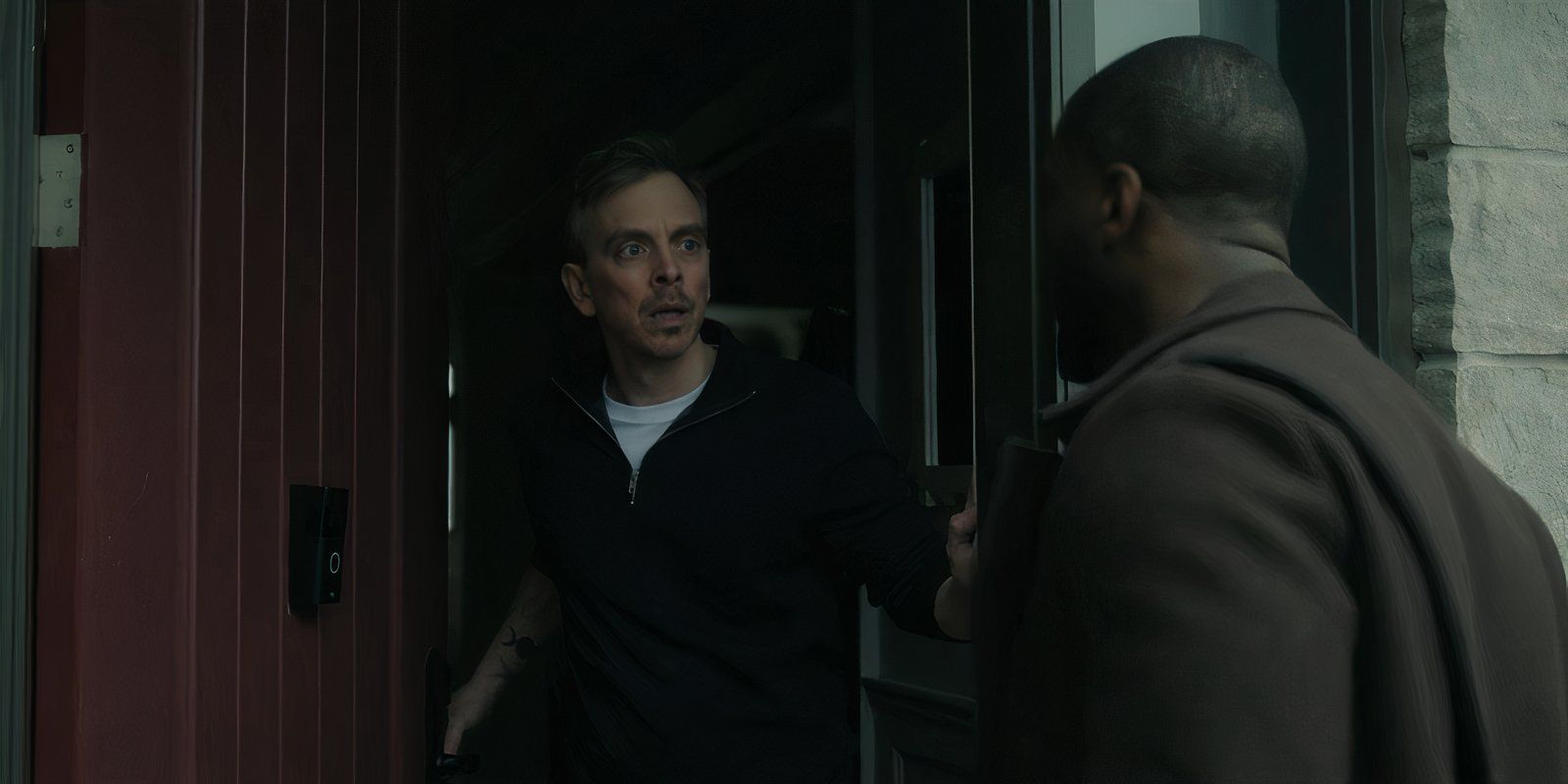 Michael Grisham talks to Alex Cross at the front door in Cross season 1 episode 6