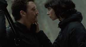 Miles Teller and Anya Taylor Joy staring into each other's eyes in The Gorge