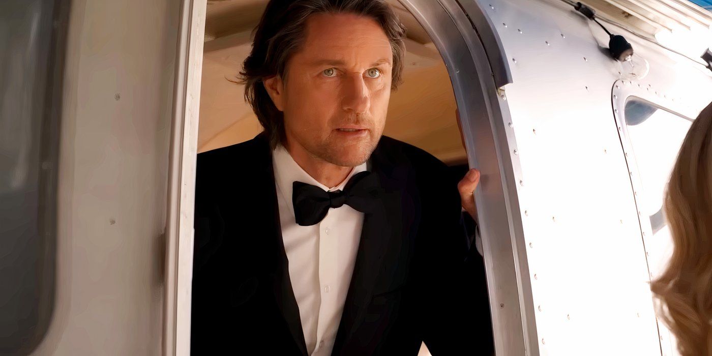 Martin Henderson wearing a tuxedo and emerging from a door in Virgin River season 6