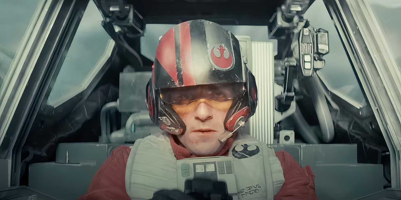 Poe Dameron (Oscar Isaac) wearing a helmet and flying an X-wing in Star Wars The Force Awakens